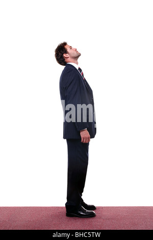 Full length shot of a businessman looking up high. Stock Photo