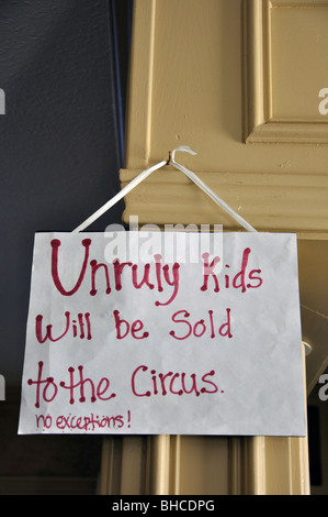 Note in museum saying 'Unruly kids will be sold to the circus. No exceptions.' Stock Photo