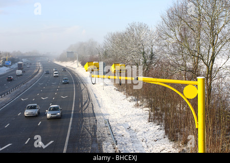 December 2009 - Bright yellow cameras to record car average speeds in UK Stock Photo