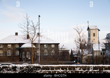 Icelandic Parliament 'Althingi' (L) and Domkirkjan church (R). Reykjavik Iceland Stock Photo