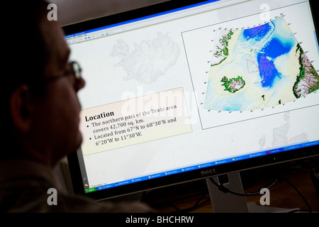 Thorarinn S. Arnarson, Oceanographer and Hydrocarbon Licensing Manager, shows a map of the Dreki area. NEA in Reykjavik, Iceland Stock Photo