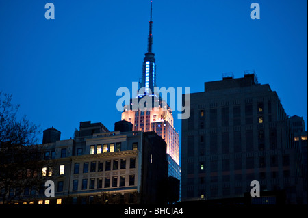 Empire State Building lit up at night. Stock Photo