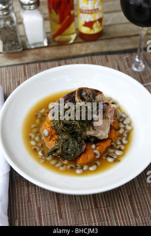 Cajun Cuisine, Ham Hock with Sweet Potatoes, Pickled Greens & Black Eye Pea Ham Broth, Cochon Restaurant, New Orleans, Louisiana Stock Photo