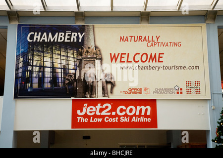 Jet2.com advert inside departure terminal: Chambery airport near Aix les Bains on Lac du Bourget in Savoy department of France Stock Photo