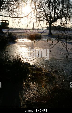 Looking across a wintry Blackheath Common to All Saints church, Blackheath, London, UK Stock Photo