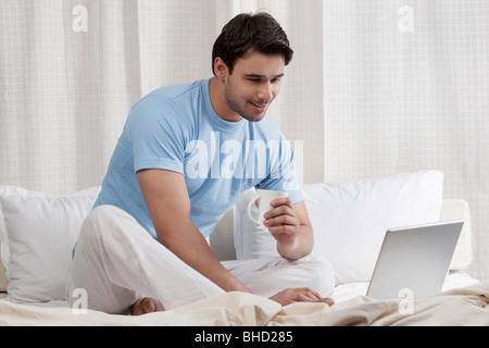 Man working on a laptop Stock Photo