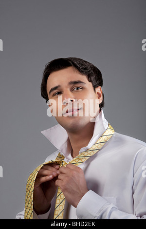 Man getting ready for office Stock Photo