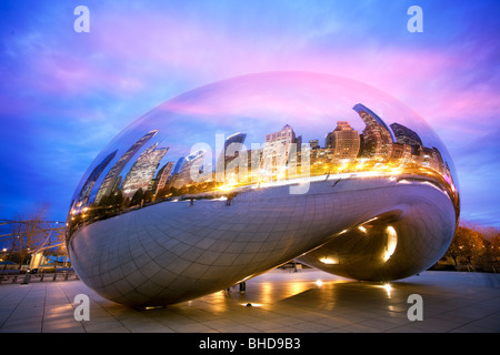 The Cloud Gate sculpture also known as 'the bean' in Millennium park viewed at dusk Stock Photo