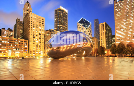 The Cloud Gate sculpture also known as 'the bean' in Millennium park viewed at dusk Stock Photo