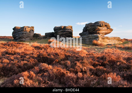 Three Gritstone rocks known as the Three Ships, located on Birchen Edge in the Peak District. Stock Photo