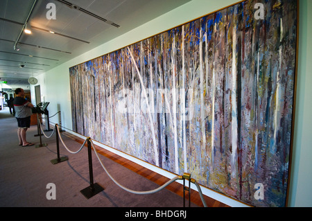 CANBERRA, Australia - The public entrance to Parliament House opens into a main foyer leading into the Great Hall, which features a tapestry based on a painting by Arthur Boyd, the original of which is also on display in the building. Functions that have parliamentary and federal relevance often take place here, but the Great Hall is also open to functions for the general public, such as weddings, and the nearby University of Canberra hosts graduation ceremonies here. Stock Photo