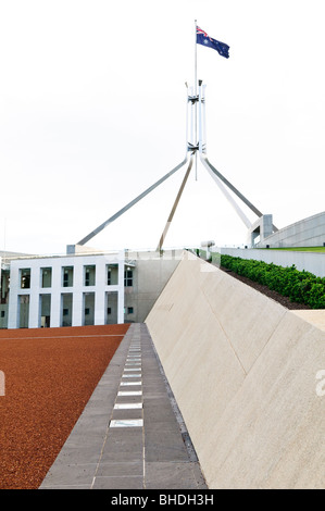 CANBERRA, Australia - Parliament House is the meeting place of the Parliament of Australia. It is located in Canberra, the capital of Australia. It was opened on 9 May 1988 by Queen Elizabeth II, Queen of Australia.[1] Its construction cost was over $1.1 billion. At the time of its construction it was the most expensive building in the Southern Hemisphere. Prior to 1988, the Parliament of Australia met in the Provisional Parliament House, which is now known as 'Old Parliament House'. Stock Photo