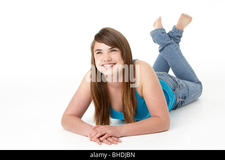 Studio Portrait Of Happy Teenage Girl Stock Photo
