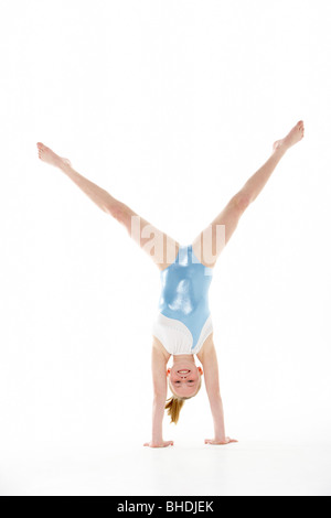 Studio Portrait Of Young Female Gymnast Stock Photo