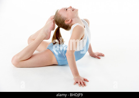 Studio Portrait Of Young Female Gymnast Stock Photo