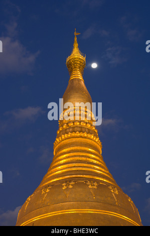 Golden stupa at night, Shwedagon Pagoda, Rangoon, Yangon; Burma, Myanmar Stock Photo