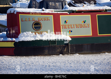 Narrow boat on frozen Leeds and Liverpool canal at Adlington
