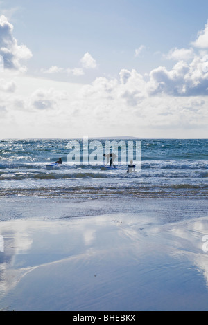 Surfers on the beach of Fanore, County Clare, Ireland. Stock Photo