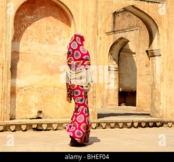 woman wearing a sari at the amber fort in jaipur india