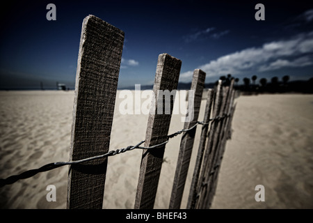 fence on a beach Stock Photo