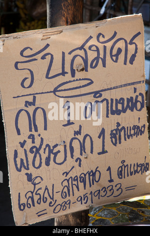 'Bush Tucker'   Price Carboard Sign  Saying Insects for sale and prices at roadside stall in Chiang Mai, Northern Thailand. Stock Photo