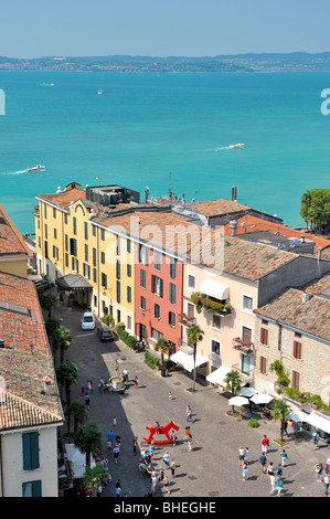 The holiday resort town of Sirmione on Lake Garda, Lombardy, Italy. From the castle over Piazza Castello to Lago di Garda Stock Photo