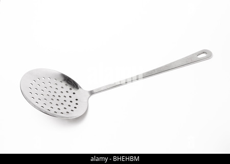 Large Stainless steel Kitchen Utensil isolated against white background. Stock Photo
