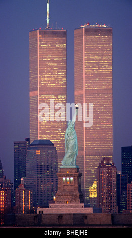 Statue of Liberty with the twin towers of the World Trade Centre in the ...