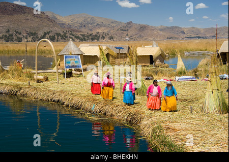 Locals on the Uros Island of Samary, Lake Titicaca, Peru Stock Photo
