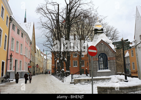 Colourful buildings and snow covered Pikk street in the Old Town, Tallinn, Estonia. Stock Photo