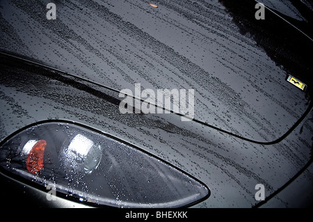 Front light cluster & bonnet (hood) of a 2007 Ferrari F430 Spyder in metallic grey. Stock Photo