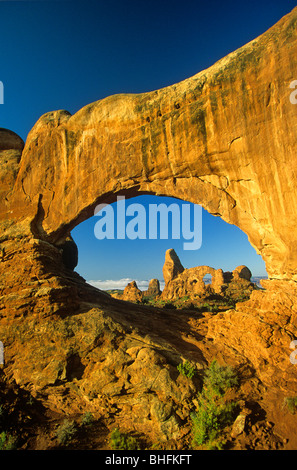 Turret Arch viewed through North Window at Arches National Park, Utah, USA Stock Photo