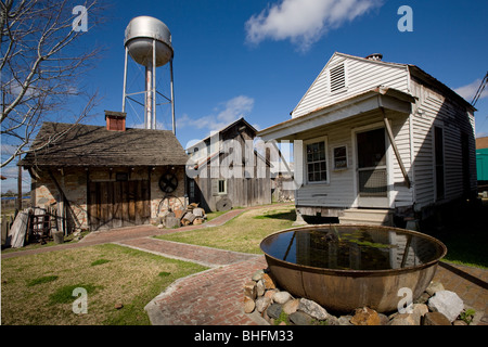 Historical cypress mill and sugar kettle in Lutcher, Louisiana, on the River Road above New Orleans Stock Photo