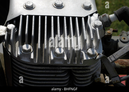 Air cooling fins on cylinder head of small side valve engine Stock Photo