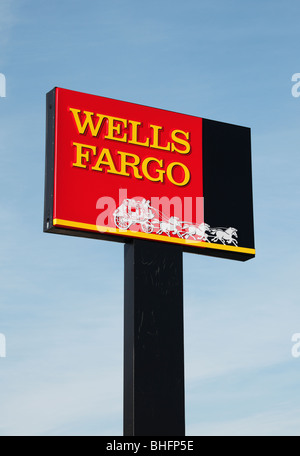 Sign in front of a Wells Fargo bank branch. Stock Photo