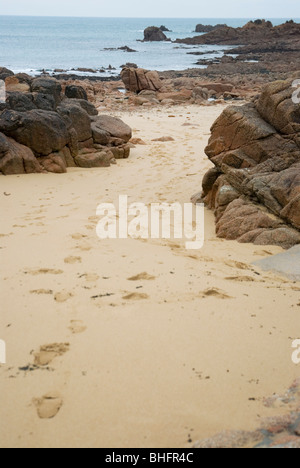 footprints in sand, beach in Jersey, British Channel Islands Stock Photo