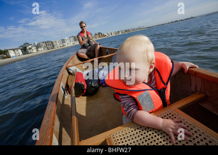 Baby girl and her mother canoeing in San Diego Bay, San Diego, California, USA Stock Photo