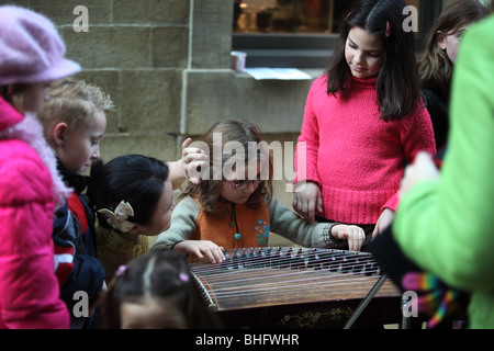 Kuzhan Chinese musician girl China town Asia show performance celebration celebrations China motion traditional travel colourful Stock Photo