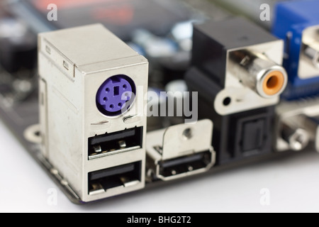 Keyword, mouse, PS/2, USB, HDMI, SPDIF, coaxial, optical, ports on the computer mainboard Stock Photo