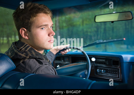 Teenage boy in car Stock Photo