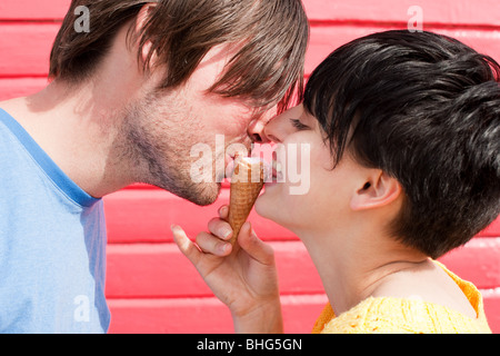 Couple sharing an ice cream Stock Photo