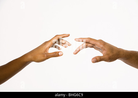 Hands reaching out Stock Photo