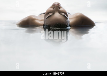 Young woman in water Stock Photo