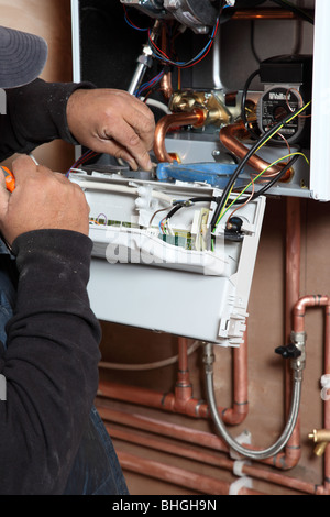 Installation of a new Vaillant ecotech 637 condensing boiler. Stock Photo