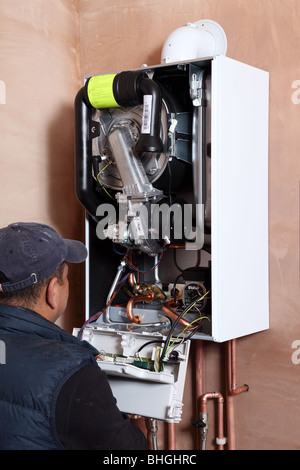 Installation of a new Vaillant ecotech 637 condensing boiler. Stock Photo