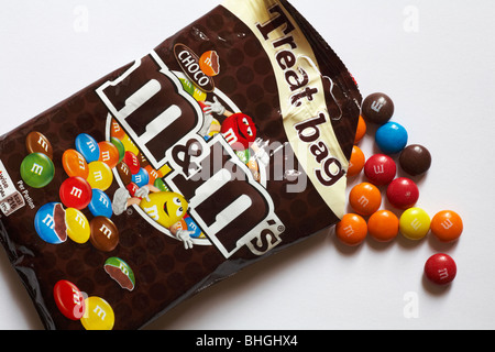 A packet of chocolate peanut m & m's on a white background Stock Photo -  Alamy