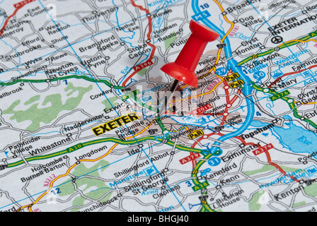 red map pin in road map pointing to city of Exeter Stock Photo