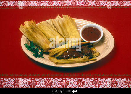 beef tamales with red sauce, beef tamale, beef tamales, Mexican restaurant, Mexican food and drink, Mexican cuisine, Novato, California Stock Photo