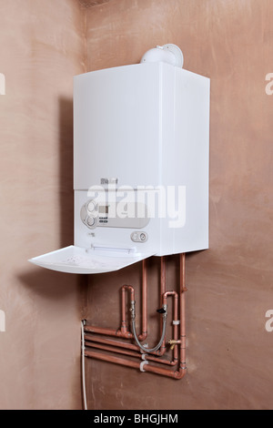 Installation of a new Vaillant ecotech 637 condensing boiler. Stock Photo