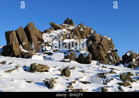 Outcrops of Spotted Dolerite - Bluestones on Carn Menyn in snow Preseli Hills Pembrokeshire Wales Cymru UK GB Stock Photo